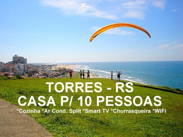 Casa De 2 Quartos Com 2 Ares-Condicionados Em Torres-Rs - Na Mais Bela Praia Gaucha - Cozinha - Banheiro - Tv Smart 32 E Wi-Fi - Estacionamento - Anfitria Superhost No Bnb Villa Екстериор снимка